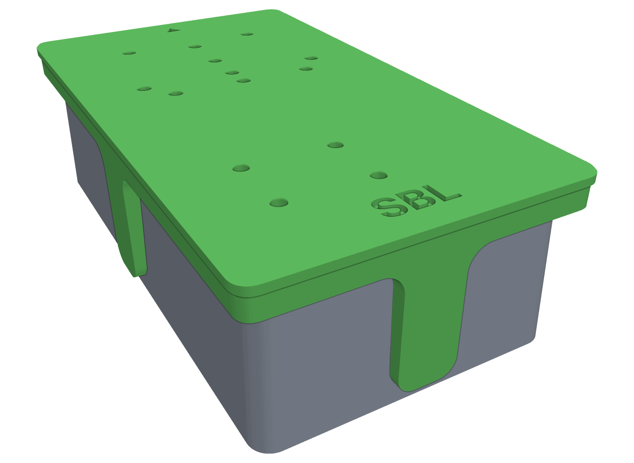 A 3D printed drill jig sitting over a 125B pedal enclosure, with a hole over every drilling position on the top face and walls wrapping onto the sides.